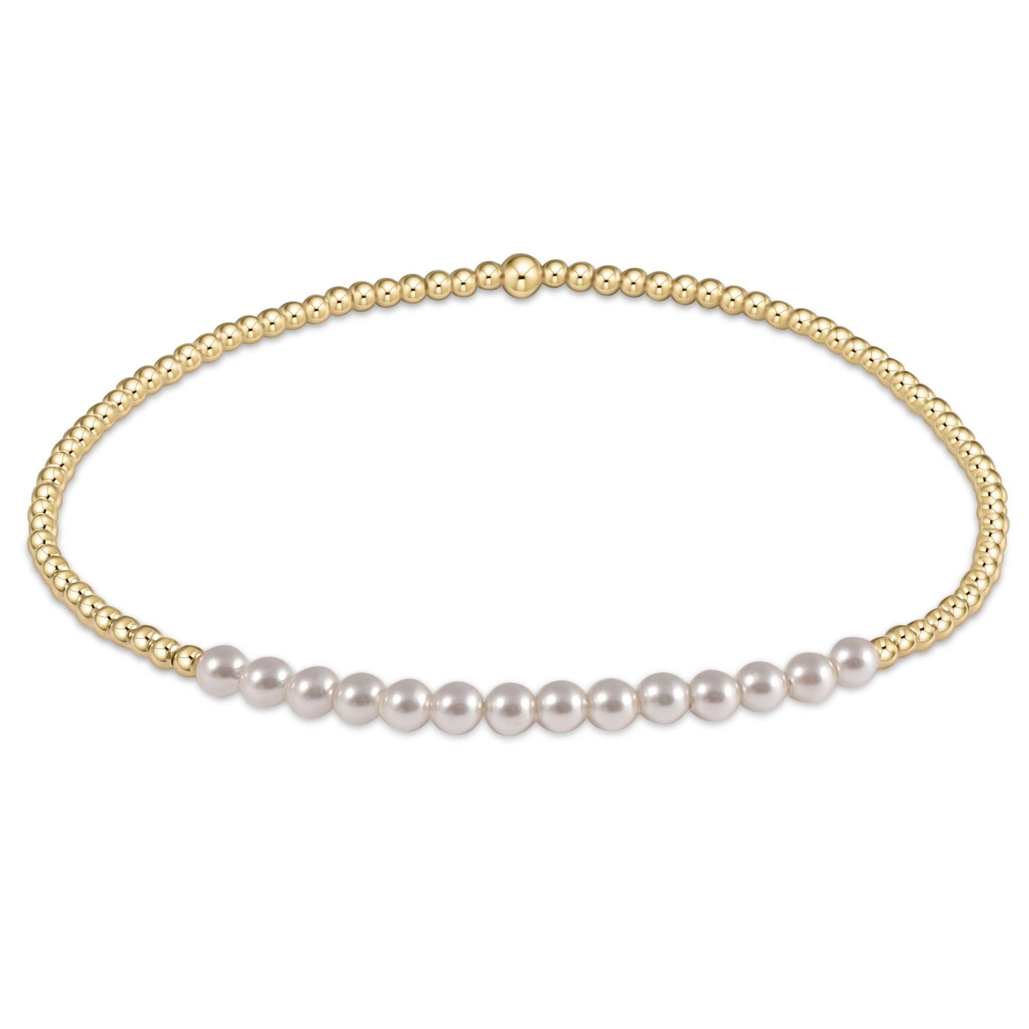 Gold Bliss bracelet featuring stacked 2mm gold-filled beads on stretch elastic cord.