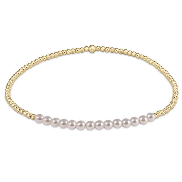 Gold Bliss bracelet featuring stacked 2mm gold-filled beads on stretch elastic cord.