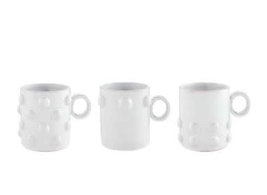 White glazed terracotta mug with beaded decorative details on the base from the Classic Home collection.