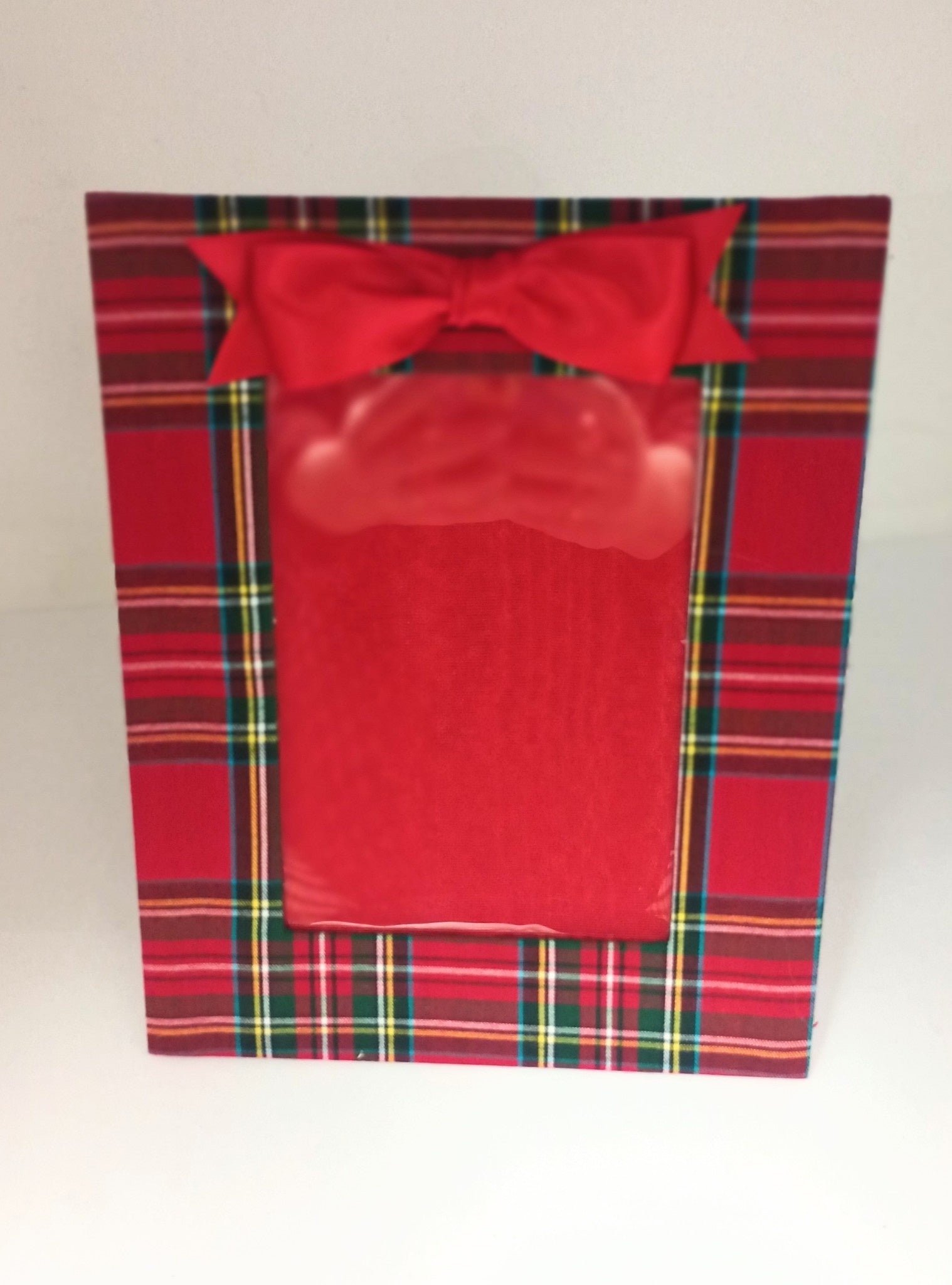 Vertical 5 x 7 frame featuring a red Highlander plaid pattern with a red satin bow accent.