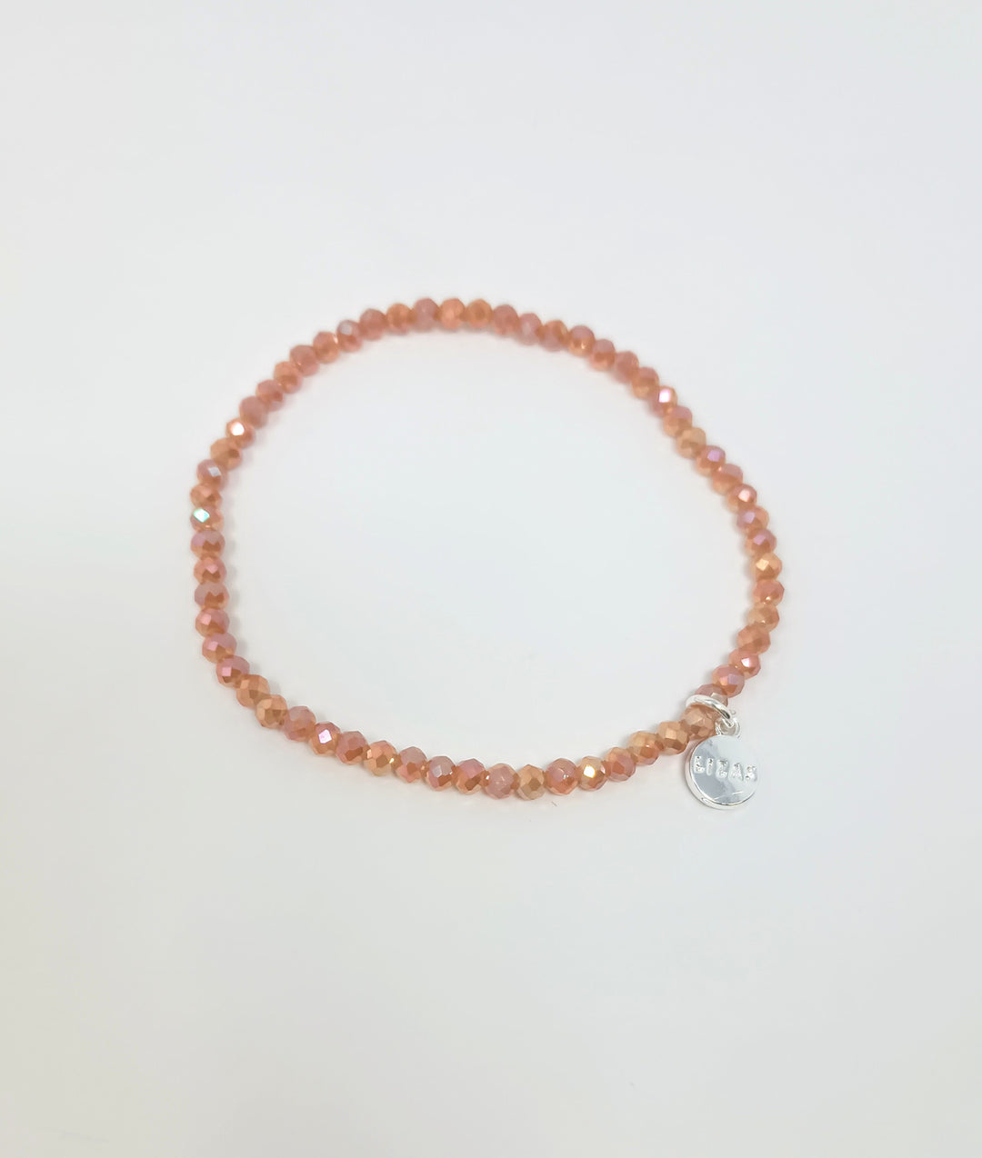 Stretchy bracelet with faceted glass beads in mixed colors.