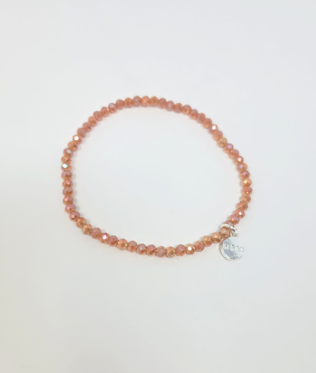 Stretchy bracelet with faceted glass beads in mixed colors.