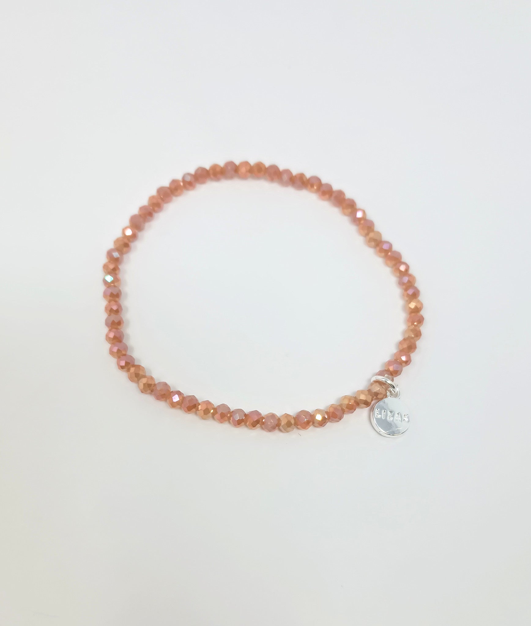Stretchy bracelet with faceted glass beads in mixed colors.