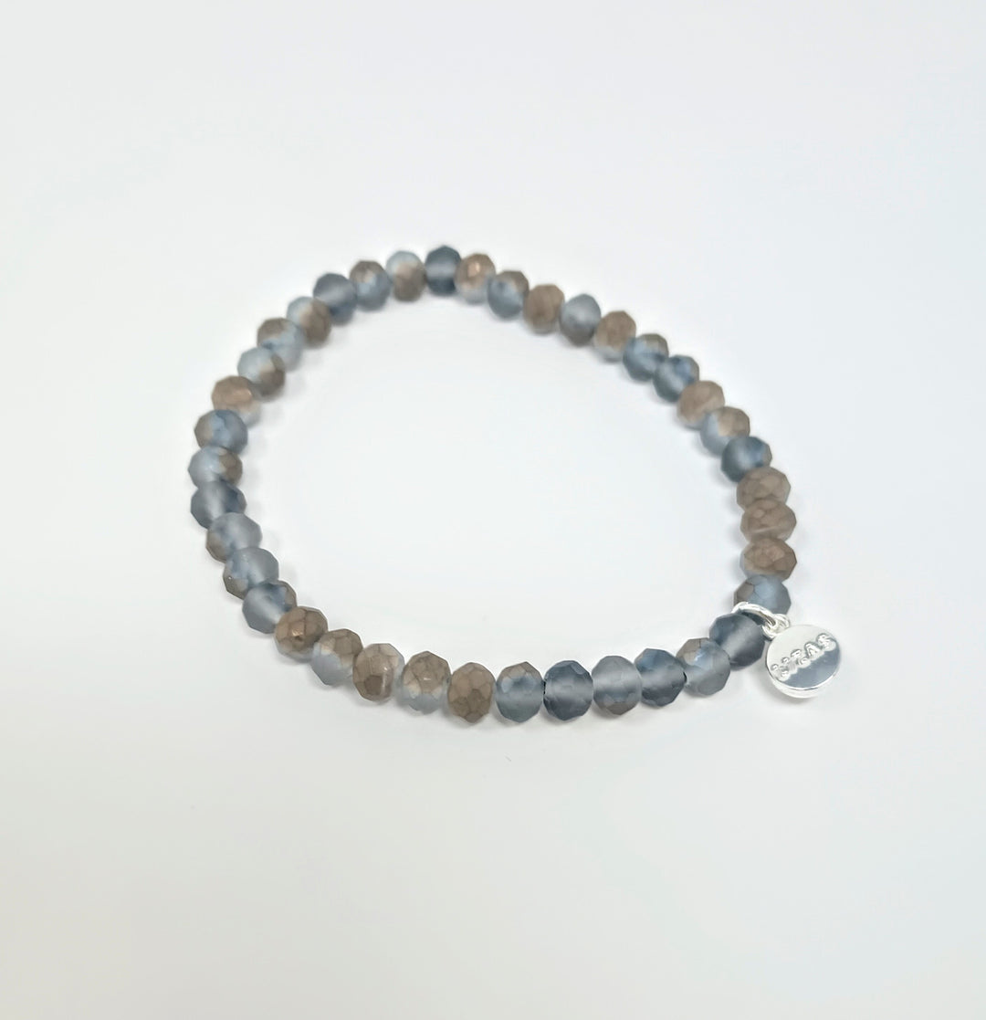 Stretchy bracelet with faceted glass beads in vibrant colors.