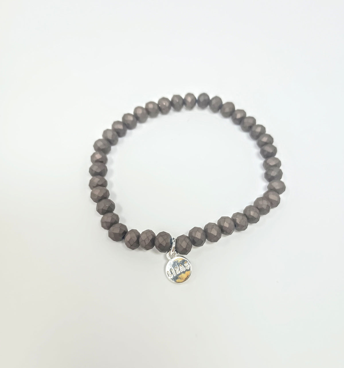 Stretchy bracelet with faceted glass beads in vibrant colors.