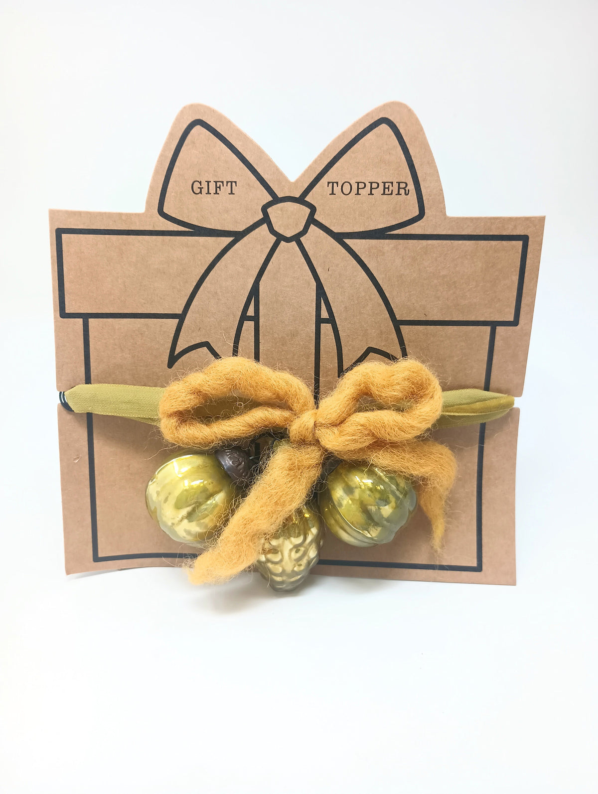 Glass ornament gift topper with festive decorative shape