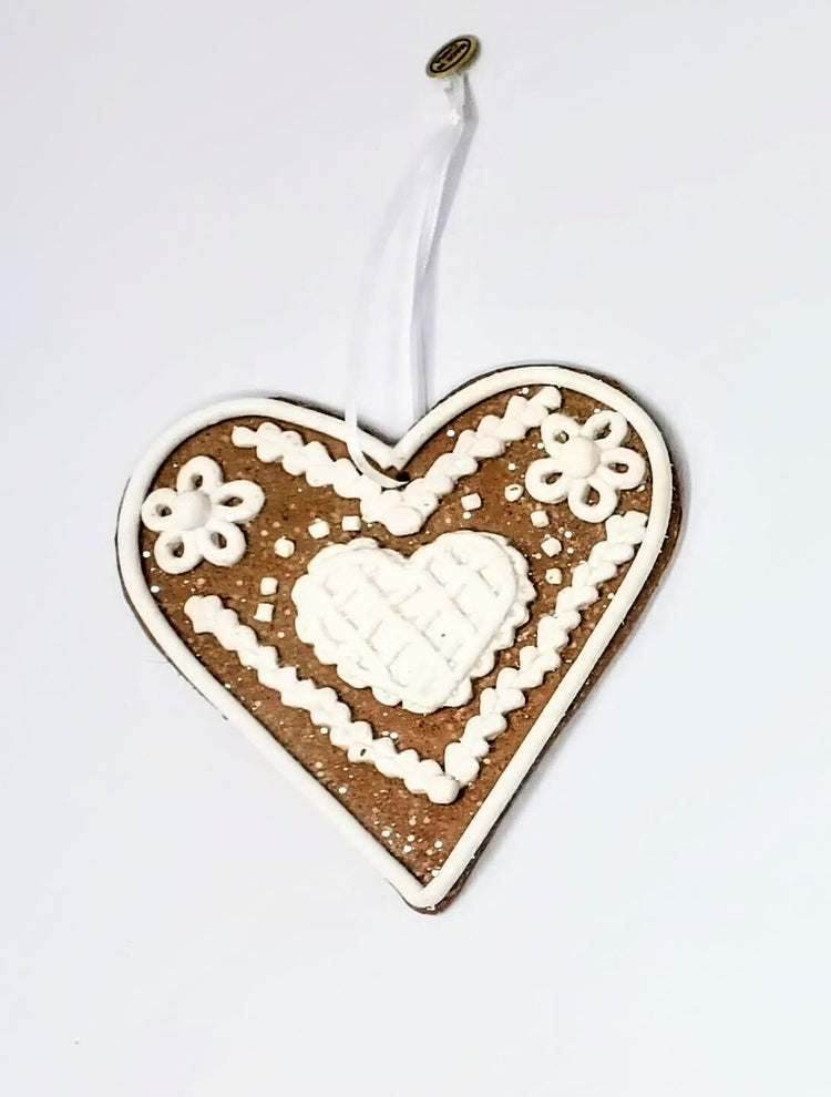 4.75-inch gingerbread clay dough ornament with a classic holiday silhouette.