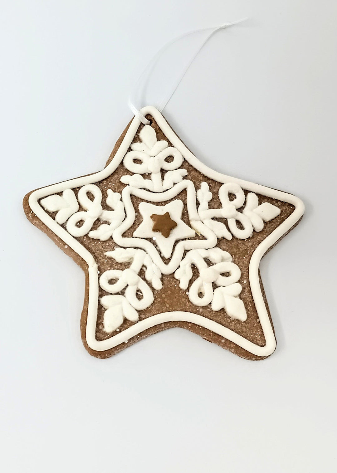 4.75-inch gingerbread man clay ornament with brown color and classic silhouette