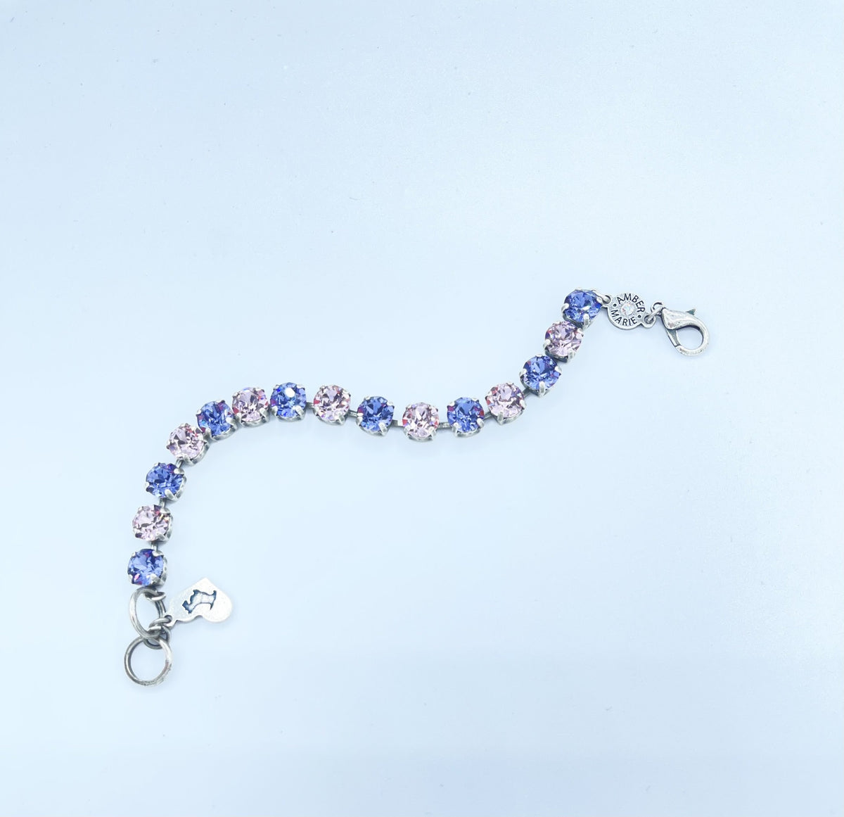 Classic Paris bracelet in lavender, lilac, white, and light green stones with an amber tag heart charm.