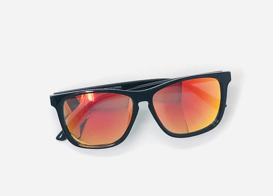Classic bright tinted sunglasses with a classic fit frame in assorted colors offering UV400 protection.