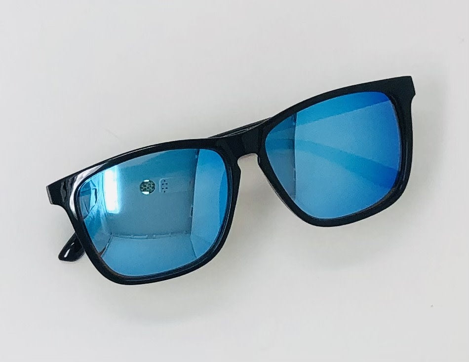 Classic bright tinted sunglasses with a classic fit frame in assorted colors offering UV400 protection.