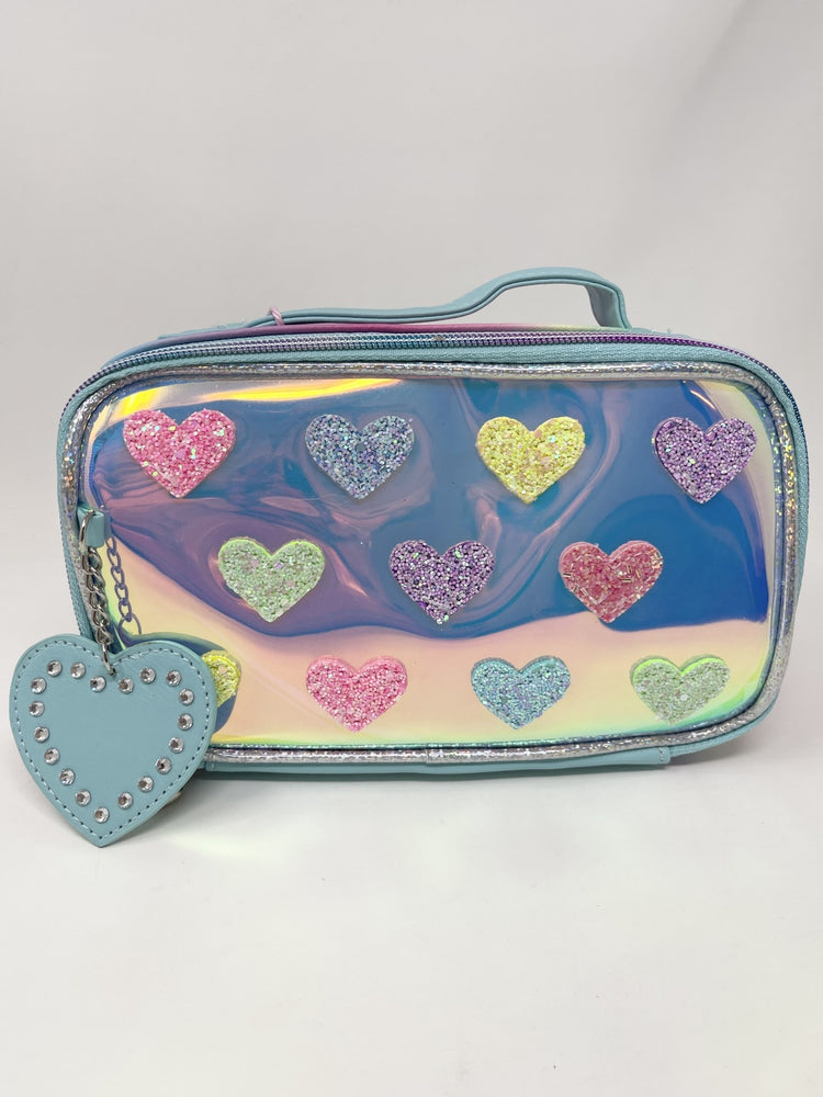 Colorful Hearts makeup bag featuring a vibrant heart pattern on fabric with an open silhouette.