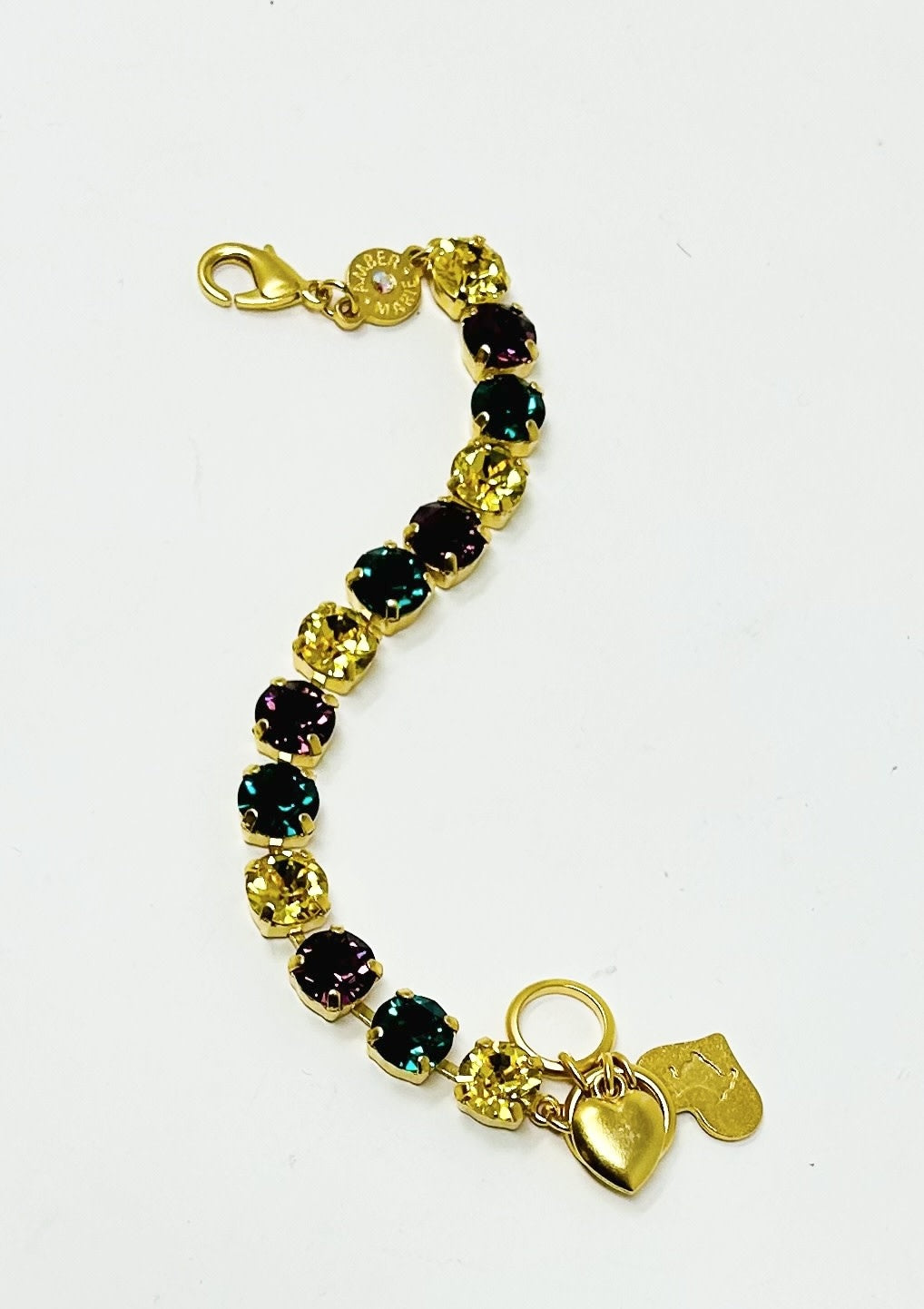 Green, yellow, and purple stone bracelet with amber tag and Scotty dog heart charm