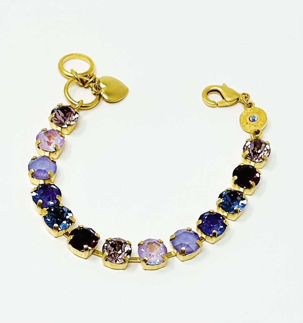 Gold Paris bracelet featuring lavender crystals, amber tag, Scotty dog heart charm