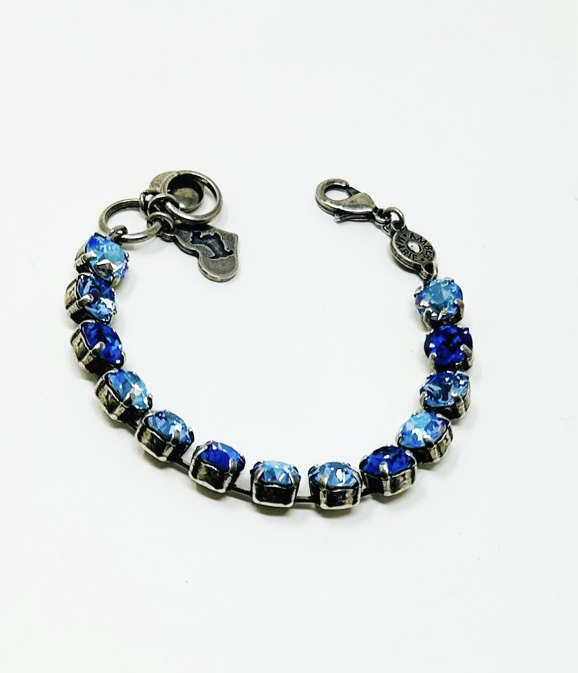 Classic Santorini bracelet featuring blue ombre stones, amber tag charm, Scotty dog heart accent