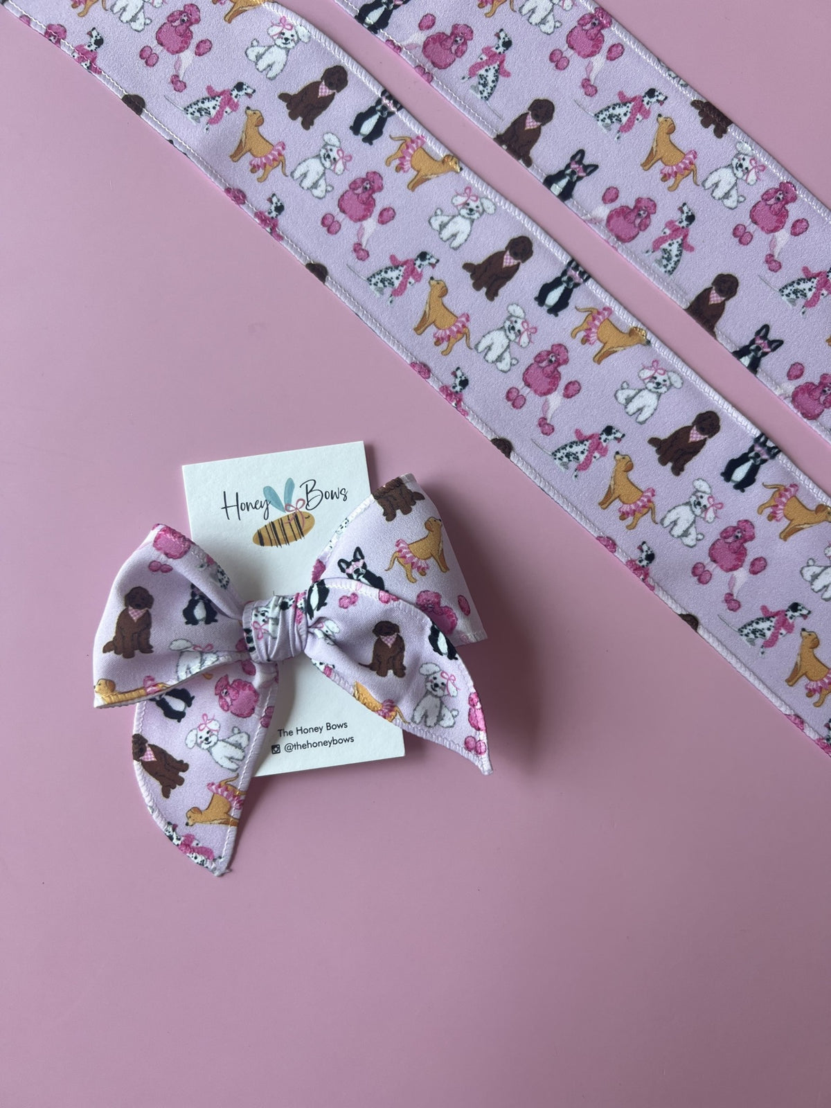 Lavender puppy bow hair clip with closed edge strip