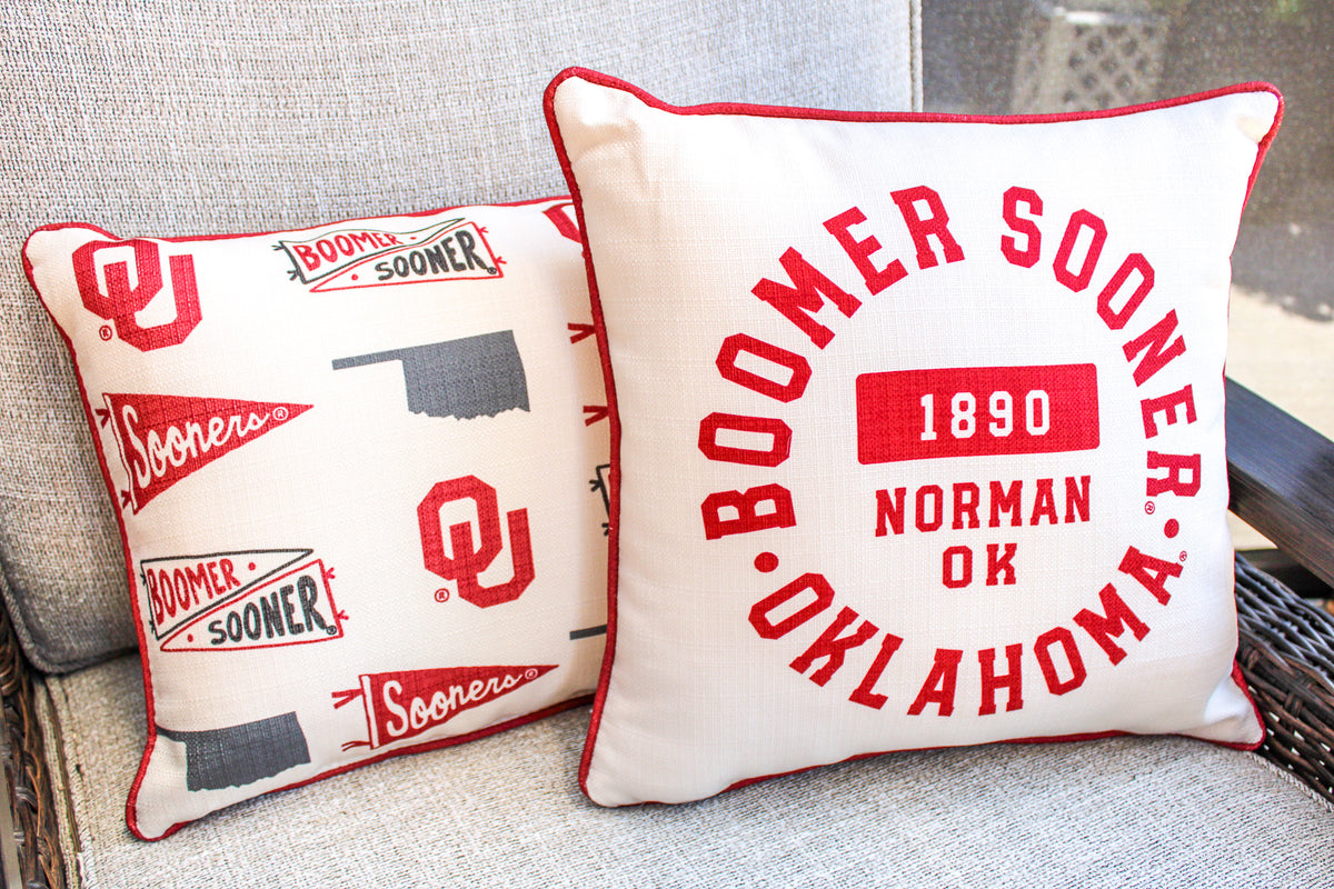 Oklahoma Athletic Circle Pillow with piping in red fabric