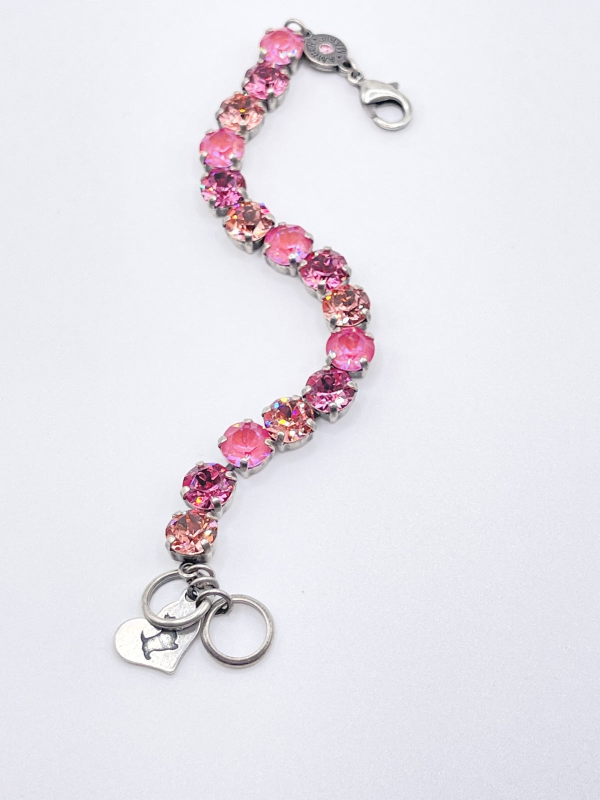 Adjustable silver-tone bracelet featuring a Scotty dog heart charm with Tampa-inspired whimsical detailing.