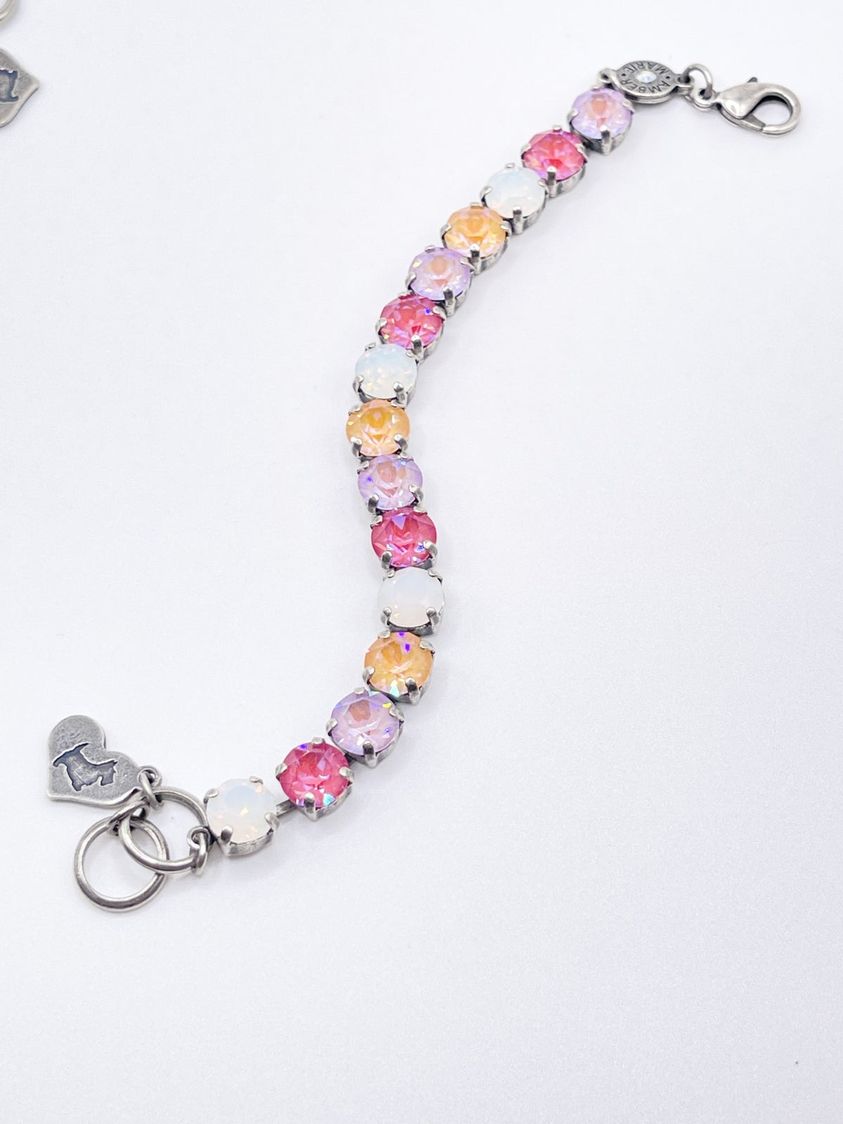 Adjustable silver-tone bracelet featuring a Scotty dog heart charm with Tampa-inspired whimsical design.