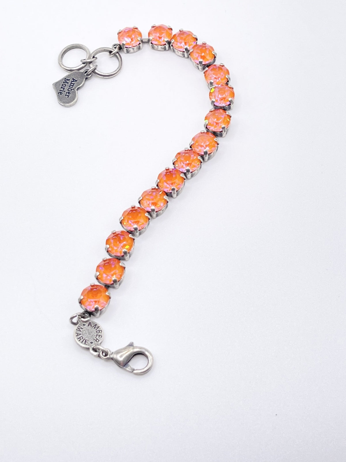 Adjustable silver-tone bracelet featuring a Scotty dog heart charm with Tampa-inspired whimsical design.