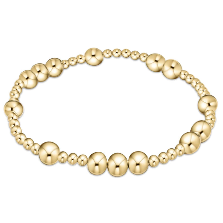 Gold-filled Hope Unwritten bracelet with mixed 3mm and 6mm beads on stretch elastic.