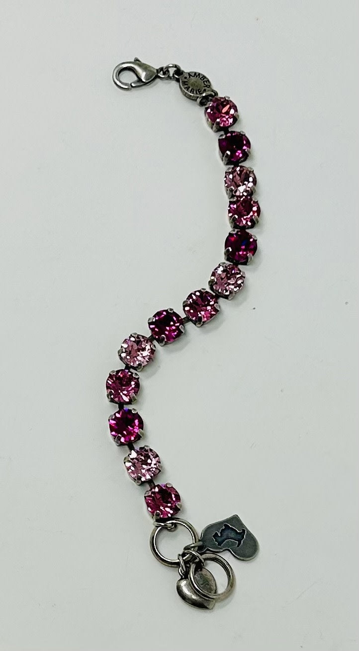 Milan classic bracelet featuring a sleek silver-tone metal link chain with an adjustable closure.