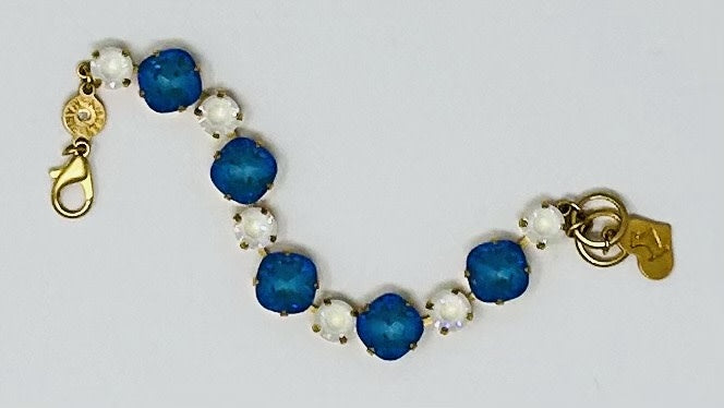 Gold Premier Santorini bracelet featuring a gold-tone finish with an intricate pattern.