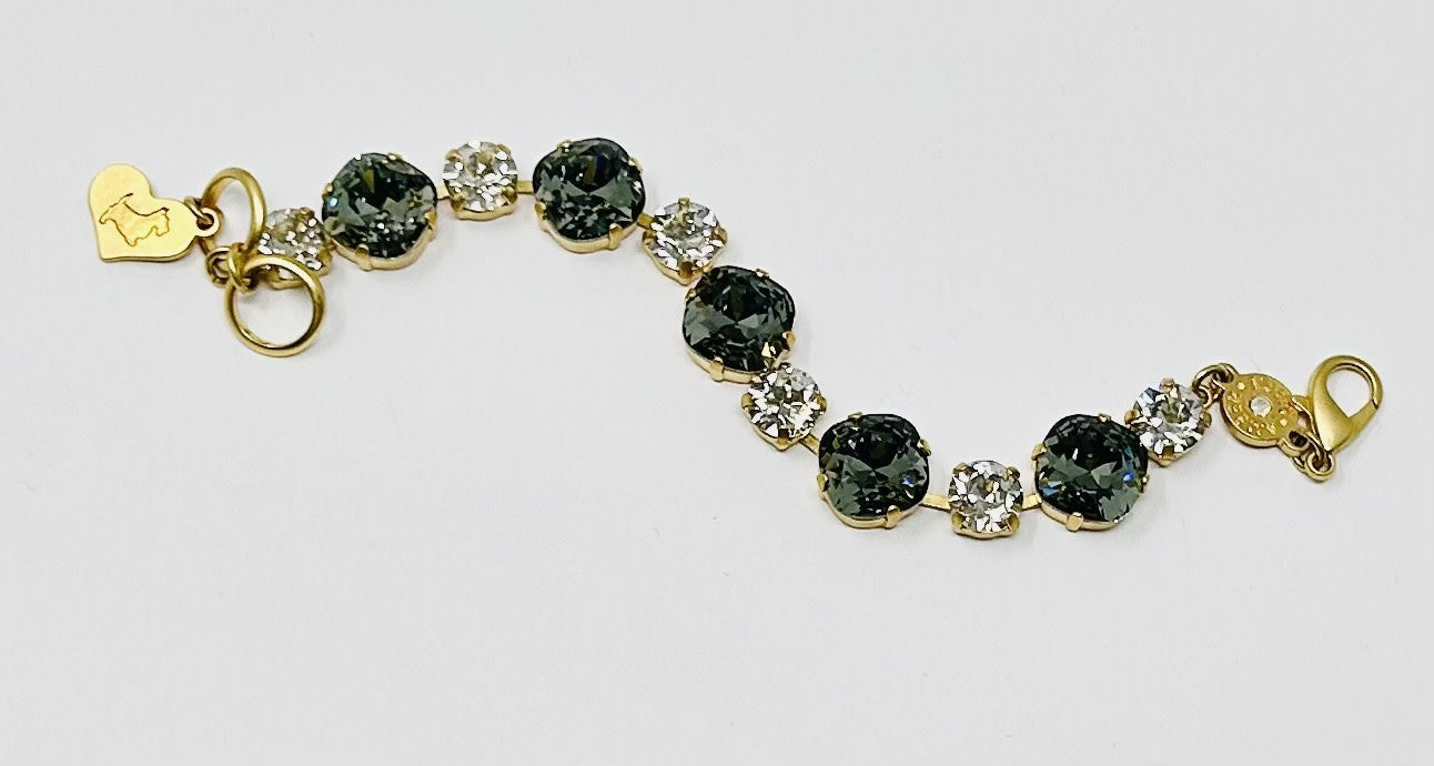 Gold Premier Bracelet featuring a sleek New York skyline silhouette in polished gold metal.