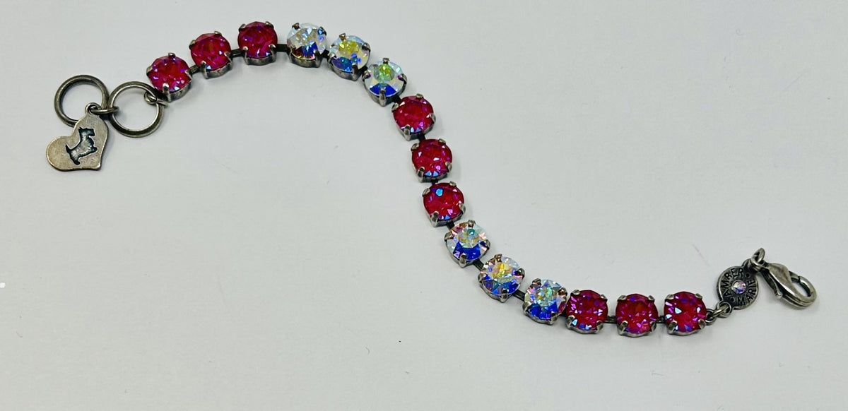 Classic Malibu bracelet in lavender, lilac, white, and light green stones with an amber tag heart charm.