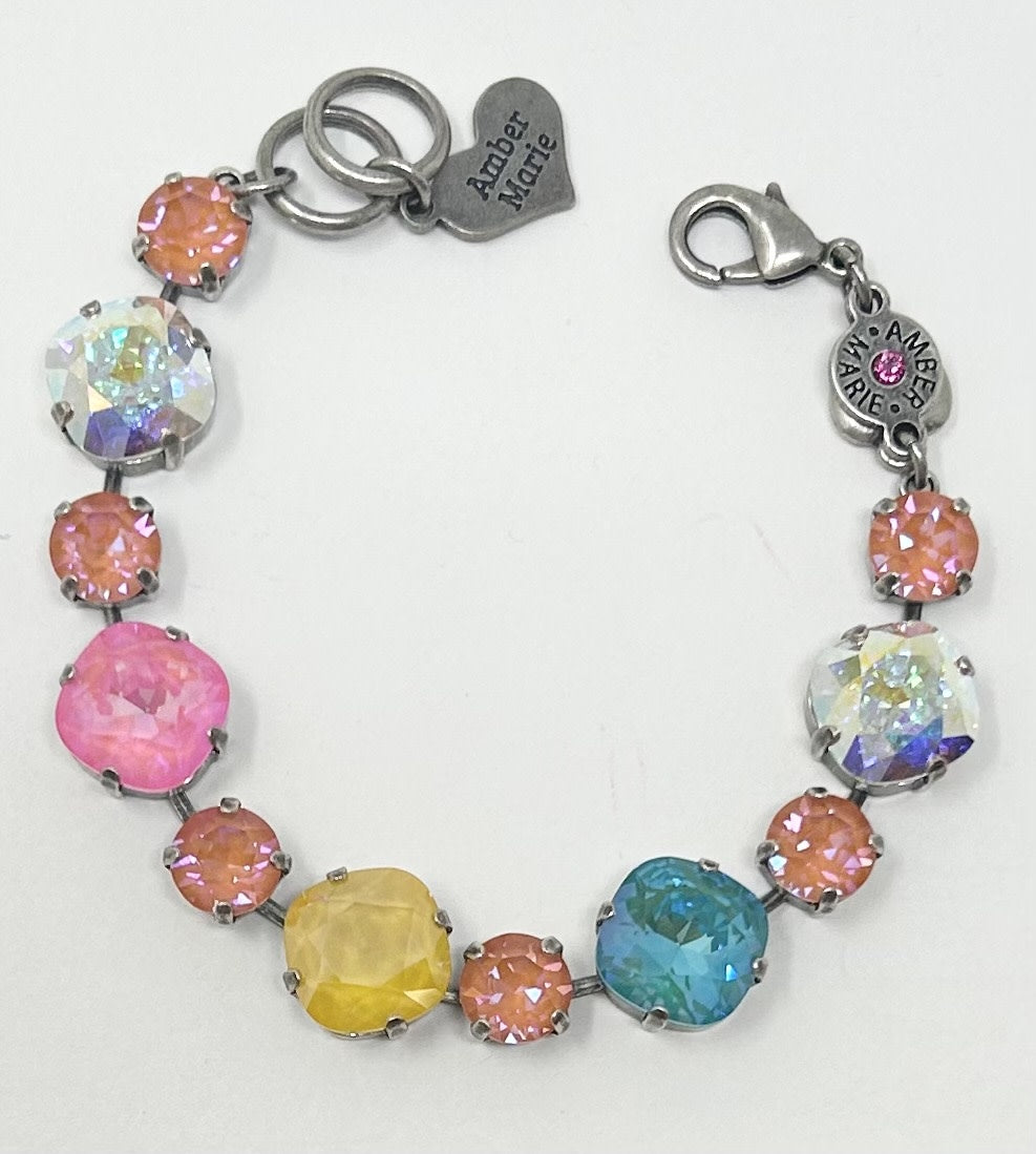 Amber Marie bracelet with colorful faceted crystal stones and a heart-shaped brand charm.