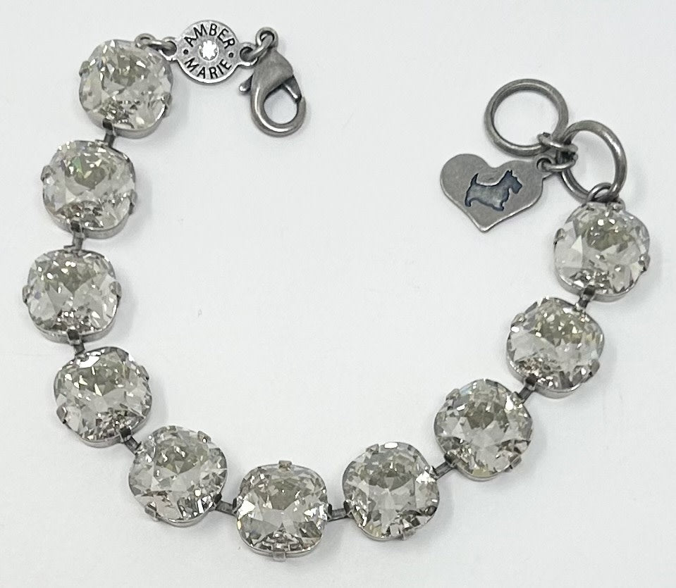 Premier Bracelet in New York featuring a sleek silver-tone metal band with an engraved city skyline silhouette.