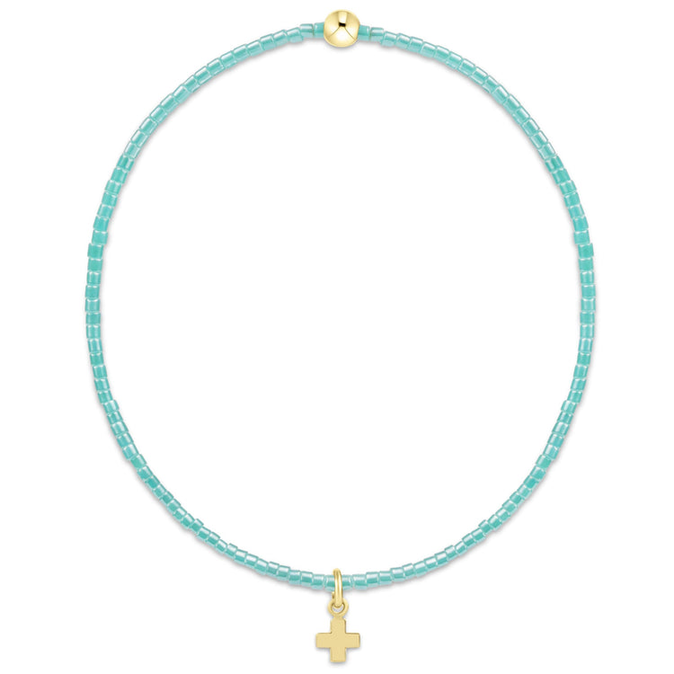 Hope Classic Bracelet with 2mm turquoise seed beads and a 14kt gold-filled signature cross charm.