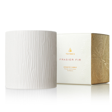 Frasier Fir Gilded Ceramic Candle in a white wood-grain textured vessel with its decorative box.