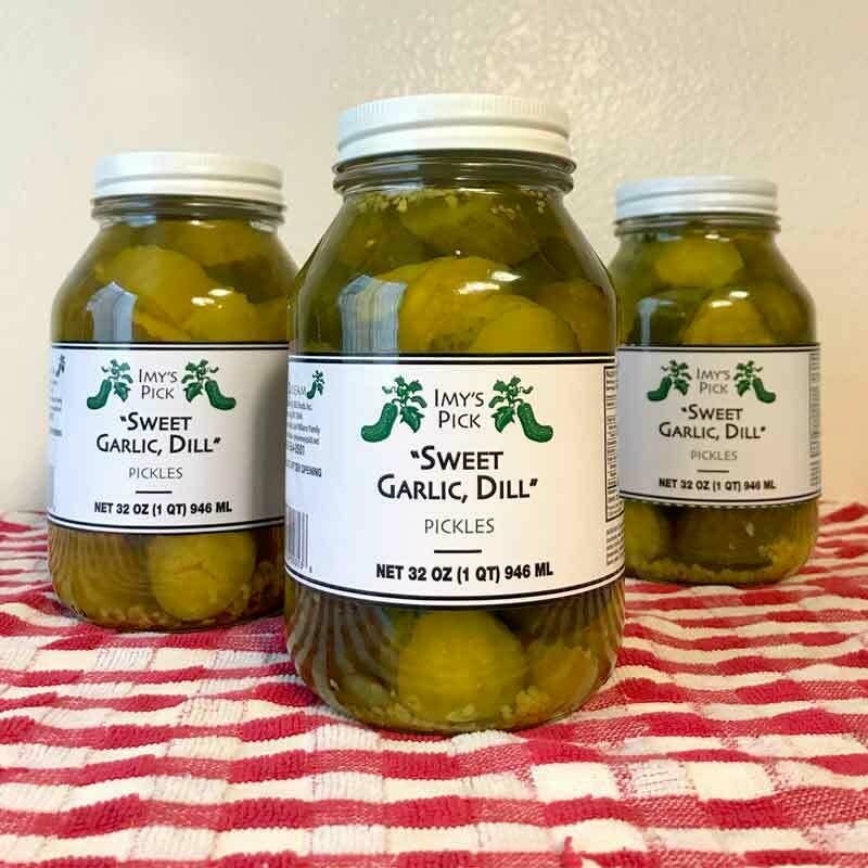 Jar of Jan's Pickles featuring a combination spicy sweet garlic dill pickle blend