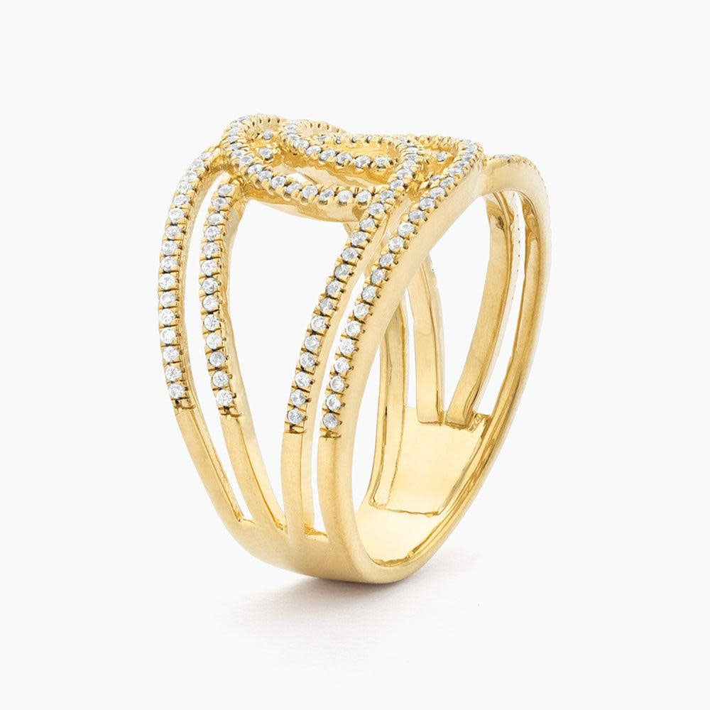 Side view of a diamond statement ring with a loop design in gold-plated sterling silver.