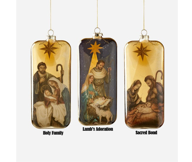 Five-inch glass nativity ornament featuring a detailed figurine with gold accents.