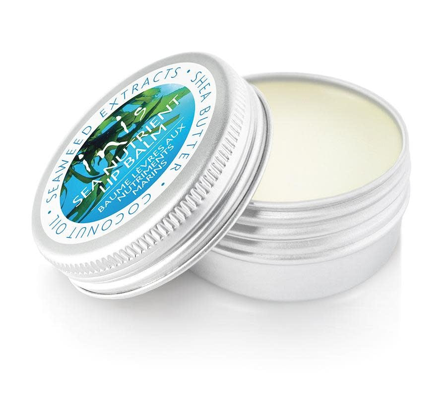 Inis Sea Nutrient Lip Balm in a white tube with green accents.