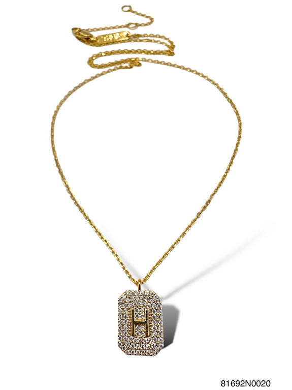 Gold initial pave tag necklace with a shimmering pavé-set letter on a sleek pendant.
