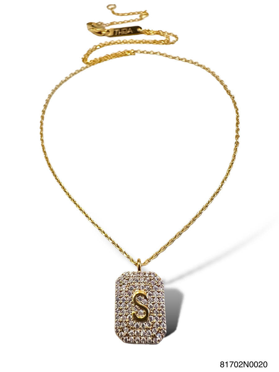 Gold initial pave tag necklace pendant with a sparkling pavé-set letter on a sleek rectangular bar.