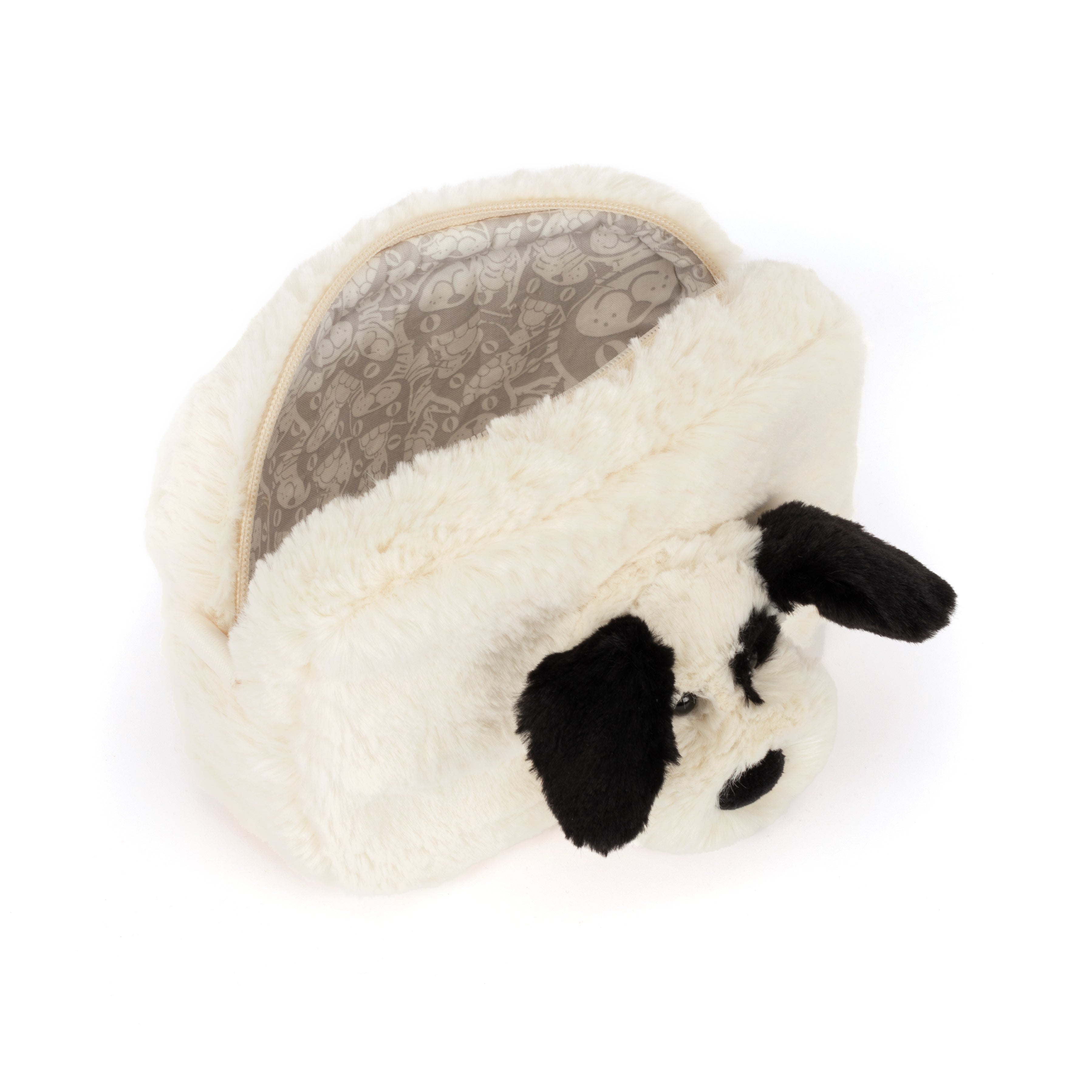 Rufferty Puppy Pouch, a white faux fur bag with a black and white dog face and floppy ears.