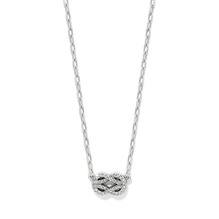 Silver plated petite necklace with interlocked crystal pendant on a lobster claw clasp.