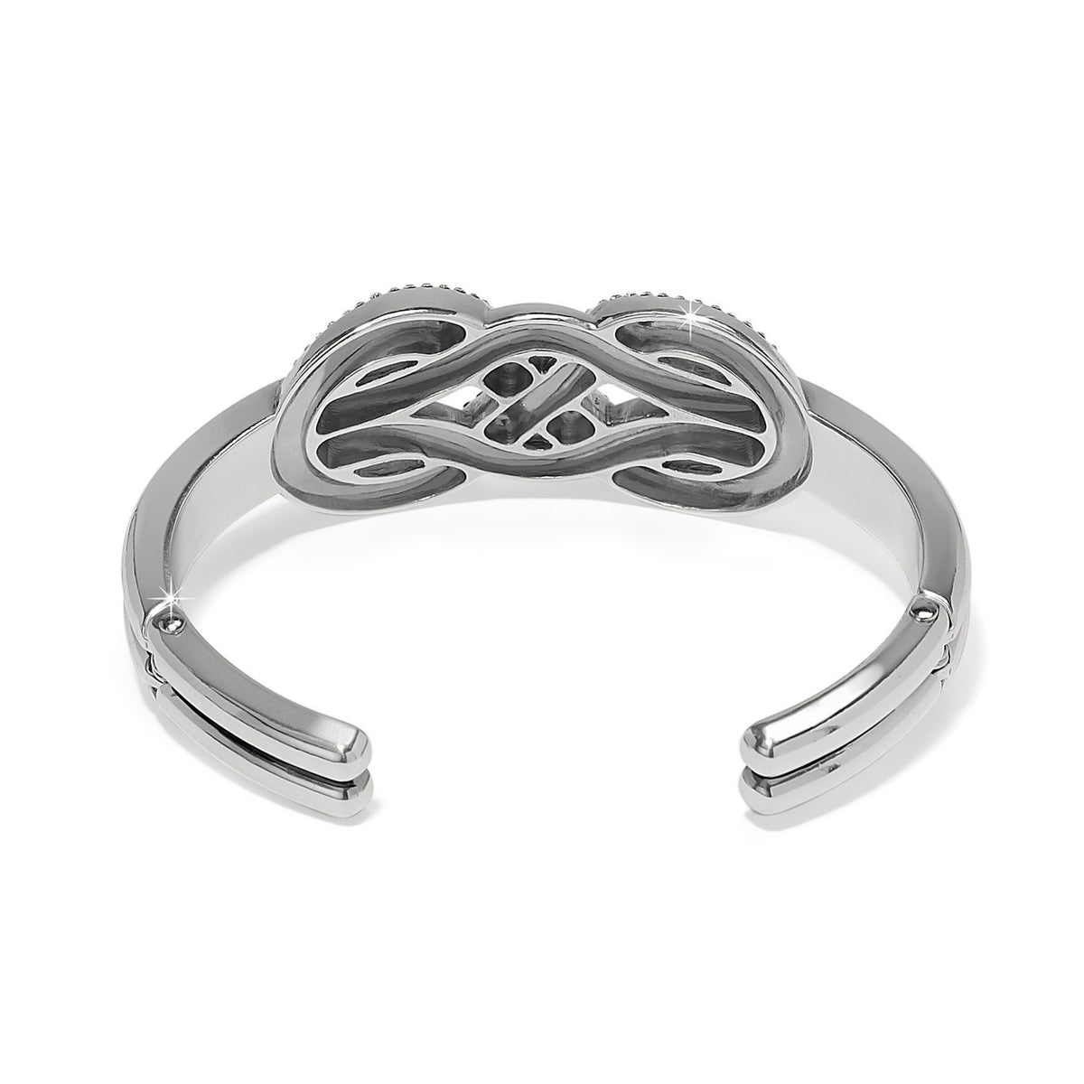 Silver hinged bangle with encrusted crystal infinity symbol pattern