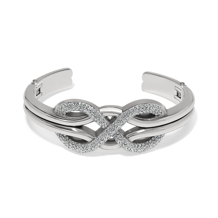 Silver hinged bangle with encrusted crystal infinity symbol