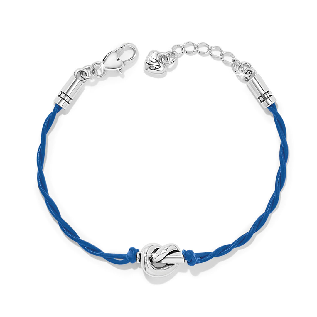 Navy leather cord bracelet with silver-plated Interlok single knot centerpiece.