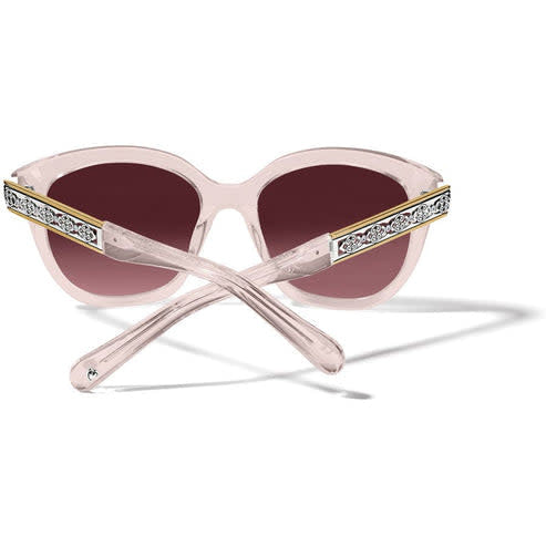 Intrigue Rosewater sunglasses with silver-plated frames in a soft rounded square shape and transparent peachy-pink tint.