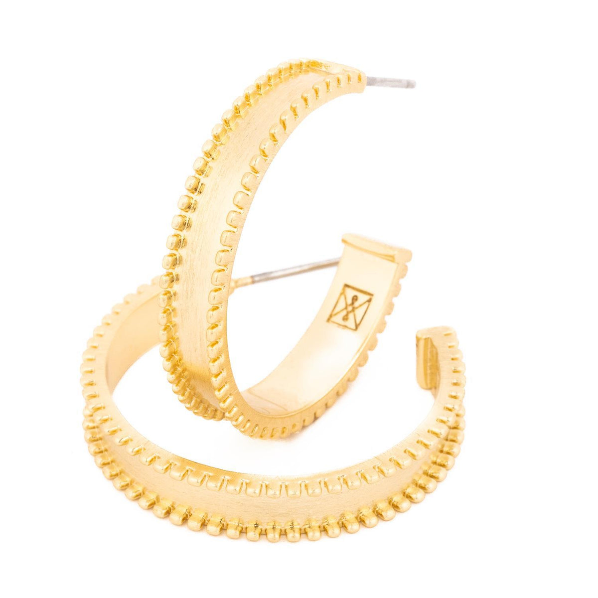 Gold hoop earrings with a textured beaded edge and a matte finish.