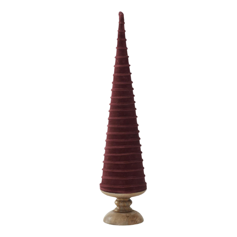 Tall burgundy velvet swirl Christmas tree on a natural wood pedestal base.