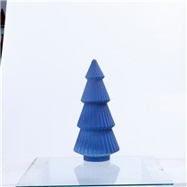 Blue glass Christmas tree with a classic conical silhouette.