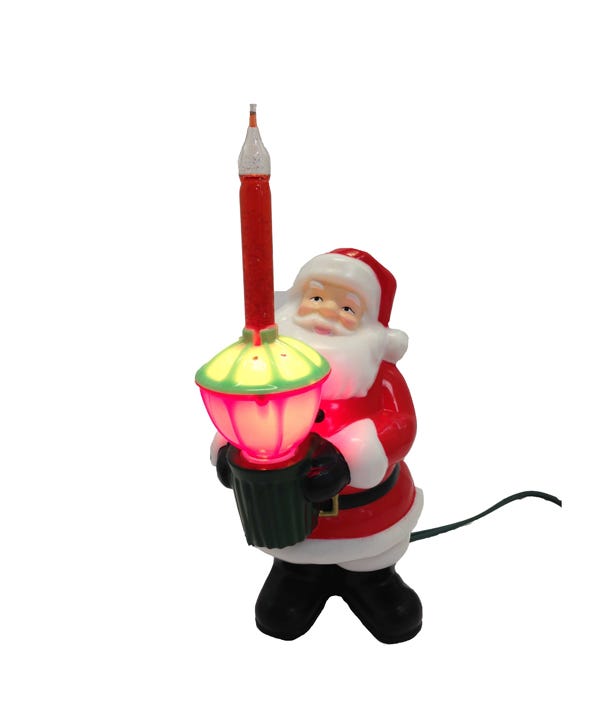 7-inch Santa Claus tabletop decoration holding a red bubble light with a glowing base.