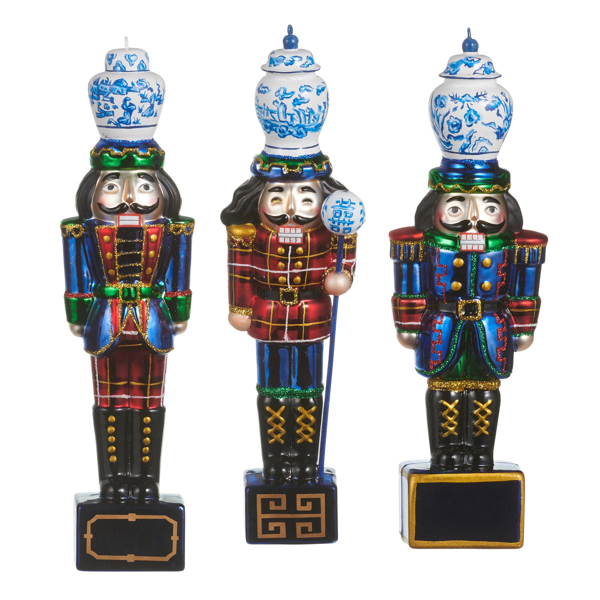 Three 8-inch glass nutcracker ornaments with blue and white ginger jar hats and glitter accents.